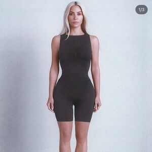 Skims RECYCLED NYLON MID THIGH ONESIE